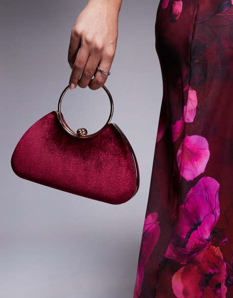 True Decadence velvet clutch bag with detachable crossbody strap in burgundy and gold - view 1
