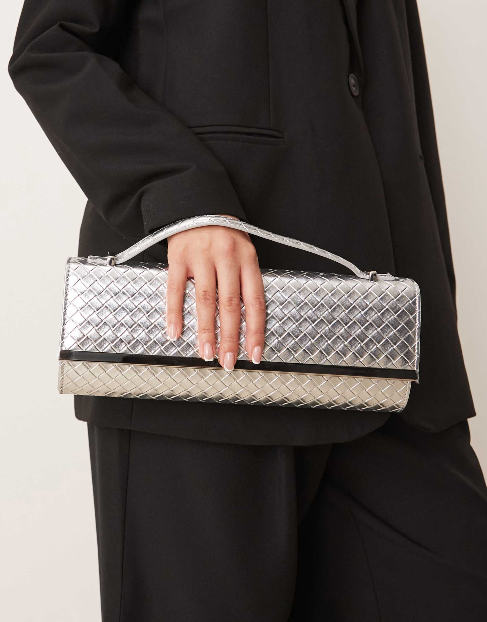 true decadence woven detailing elongated clutch purse in silver