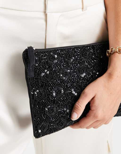 True Decadence zip top embellished clutch bag in geometric black beading