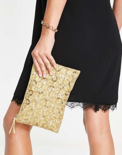 Gold store embellished clutch