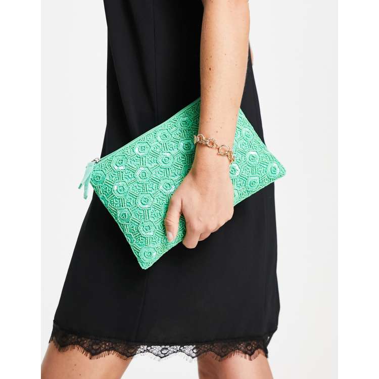 True Decadence zip top embellished clutch bag in geometric green