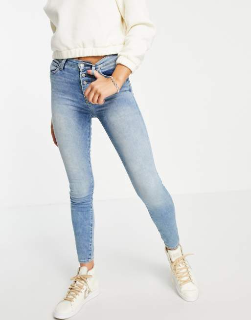 High rise store exposed button jeans