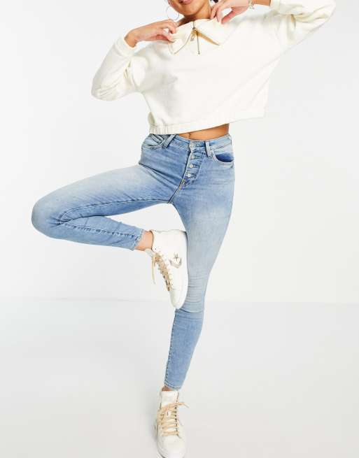 High rise exposed button hot sale jeans