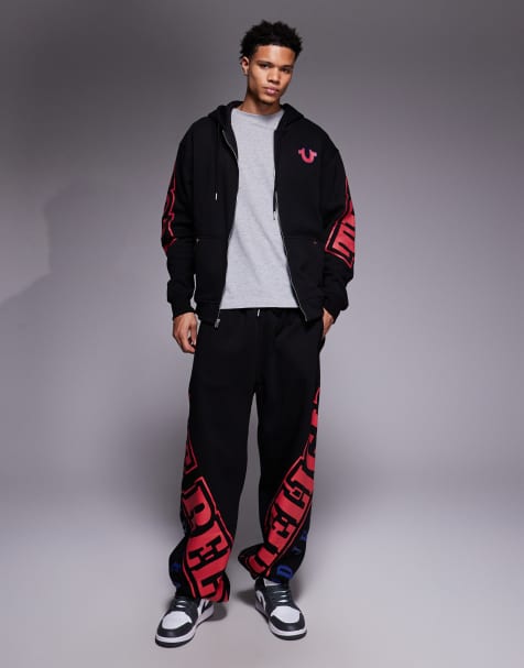 True Religion overarch zip through logo co-ord hoodie & jogger in black - view 1