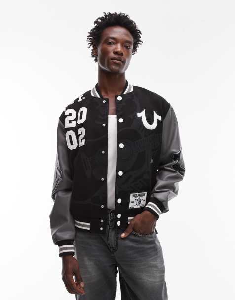 True Religion patch detail varsity bomber jacket with faux leather sleeves in black - view 1