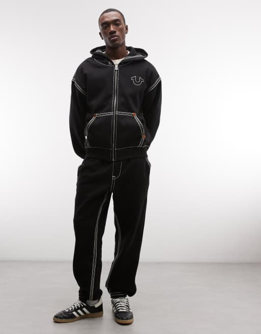 True Religion - Sweat à capuche zippé à surpiqûres contrastantes et imprimé graphique au dos - Noir, 2 de 5