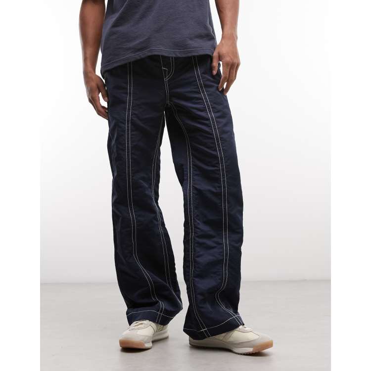 True Religion Vinny Big T nylon pant in indigo blue | ASOS