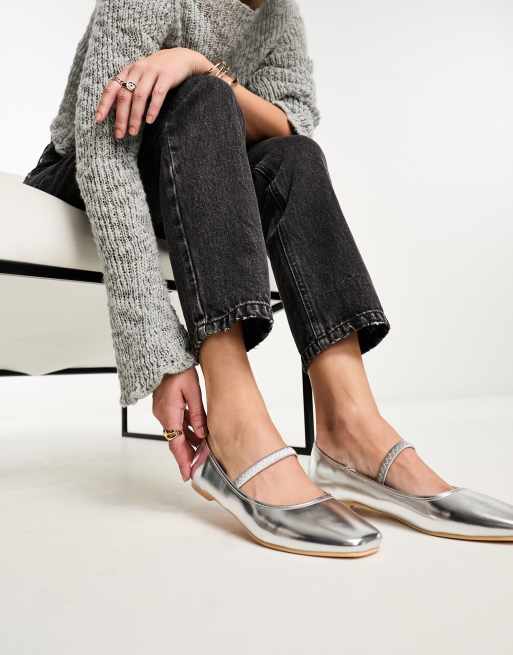 Truffle Collection ballet flat shoe with strap and bow in silver metallic