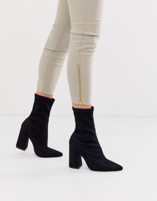 Truffle Collection block heel sock boot in black