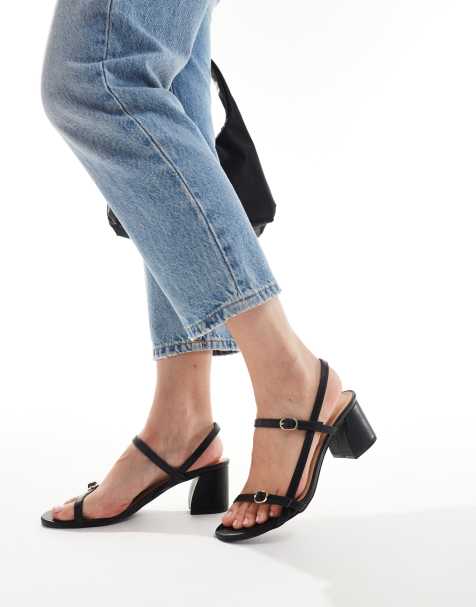 Truffle Collection block heeled sandals in black - view 1