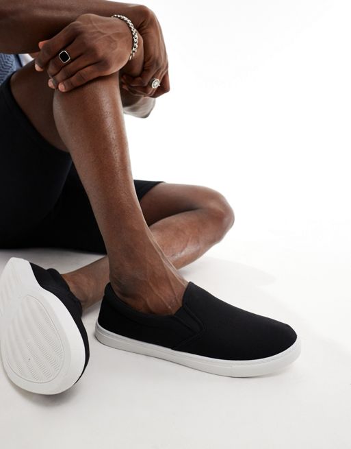 Truffle Collection canvas slip on trainers in black
