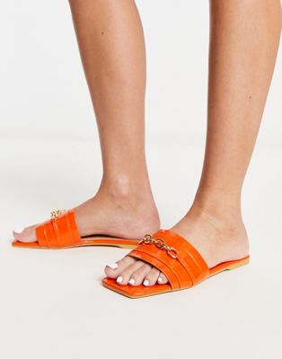 Truffle Collection chain loafer sliders in orange croc