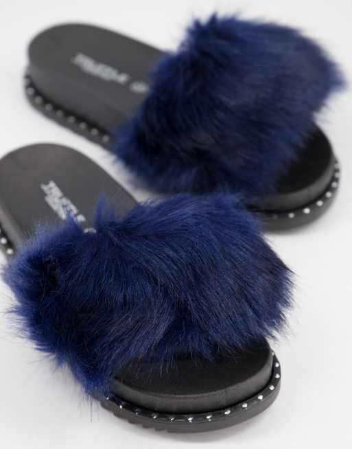 Truffle Collection Chaussons style claquettes avec fausse fourrure Bleu