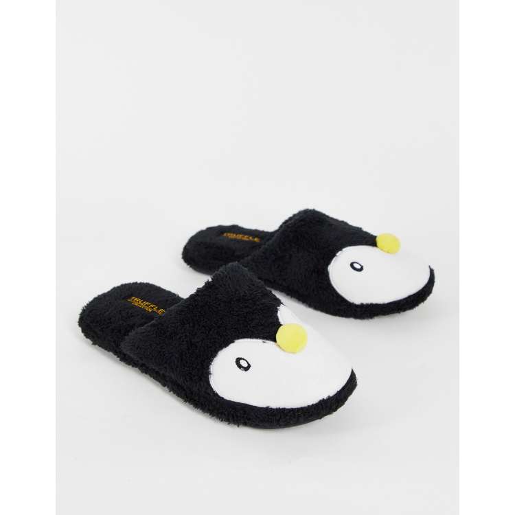 Truffle Collection Christmas penguin mule slippers in black ASOS