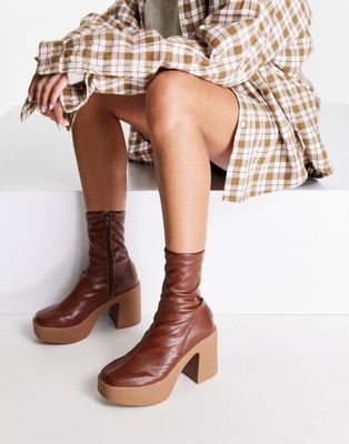Truffle Collection chunky heeled sock boots in brown