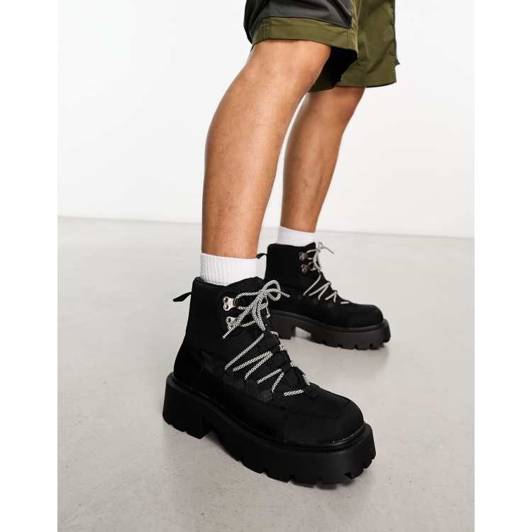 Truffle Collection chunky hiker boots with bungee cord detail in black