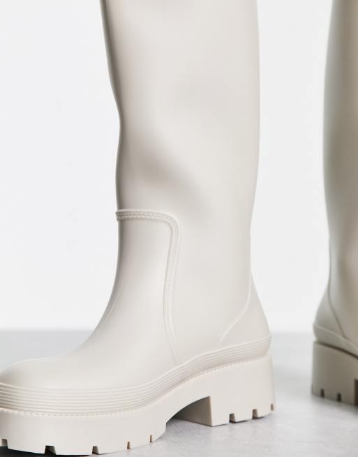 Knee high best sale wellington boots