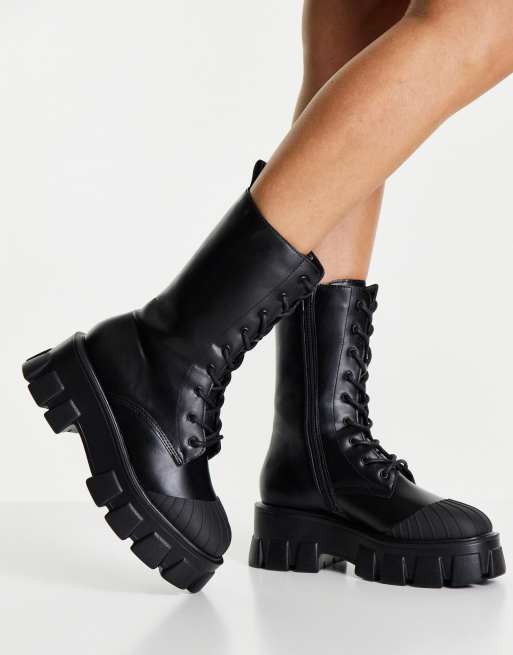 Truffle Collection chunky lace up boots in black with exaggerated