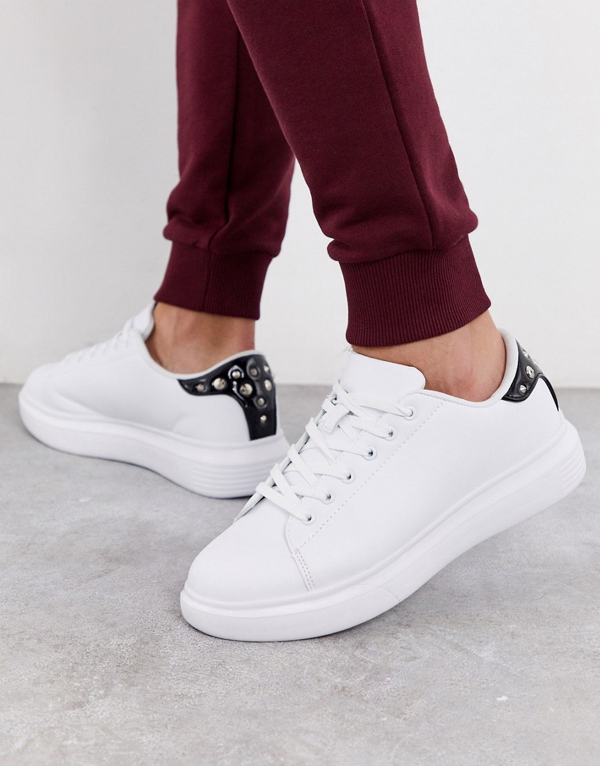 Truffle Collection chunky white trainer with studded black tab