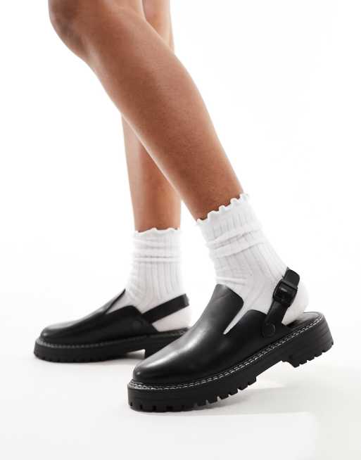 Truffle Collection – Clogs in Schwarz mit Fersenriemen