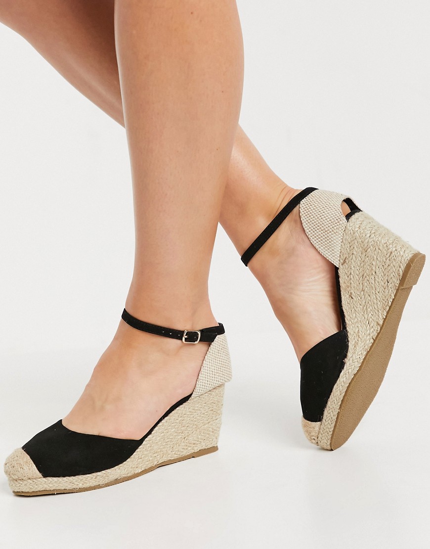 Truffle Collection closed toe wedges in black