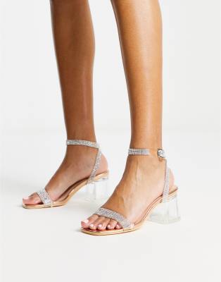 TRUFFLE COLLECTION EMBELLISHED CLEAR HEELED SANDALS IN ROSE GOLD