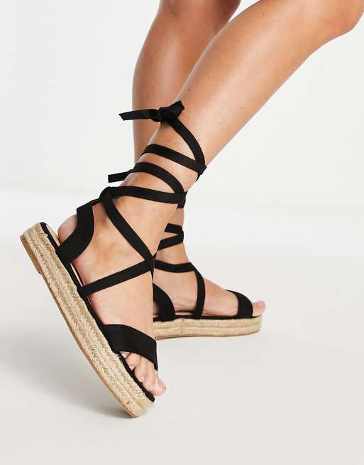 Truffle Collection espadrille tie leg sandals in black | ASOS