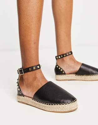 Truffle Collection - Espadrilles in Schwarz mit mit Nieten besetztem Knöchelriemen