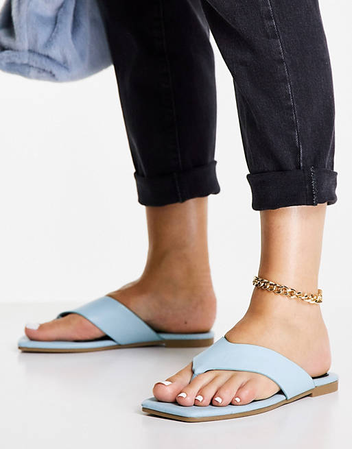 Truffle Collection extreme square toe thong sandals in blue