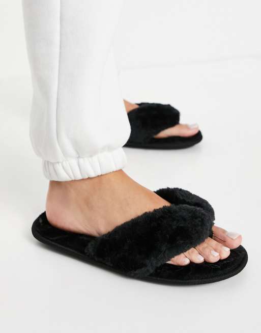 Truffle Collection faux fur thong slippers in black ASOS