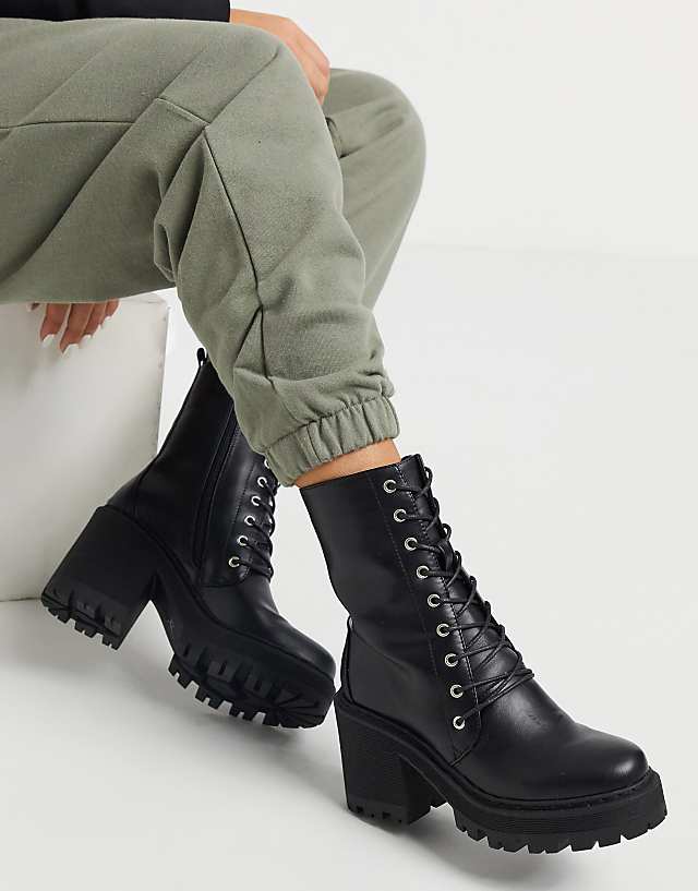 Truffle Collection faux leather chunky heeled lace up boots in black | ASOS