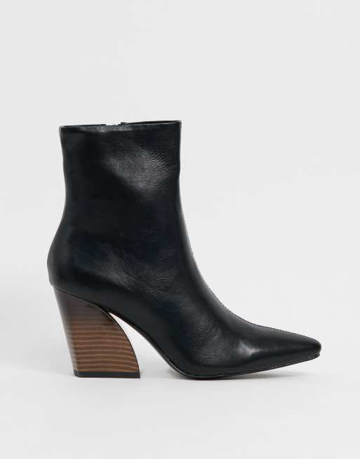 truffle collection heeled boots in black