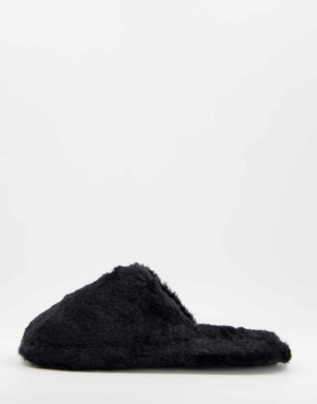 Truffle Collection fluffy mule slipper in black