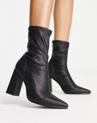Truffle Collection heeled sock boots in black | ASOS