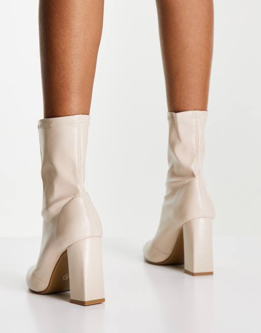 Cream on sale heeled boots