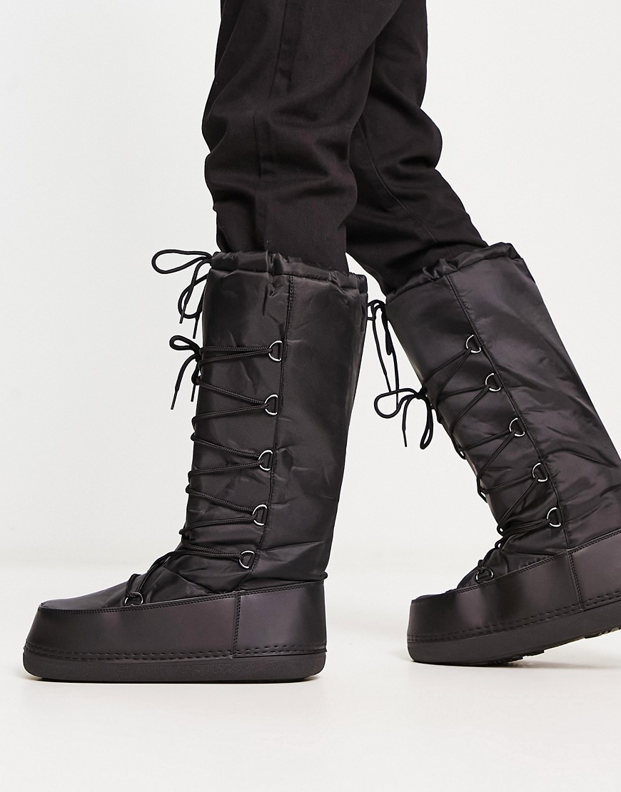 Truffle Collection high leg snow boots in black