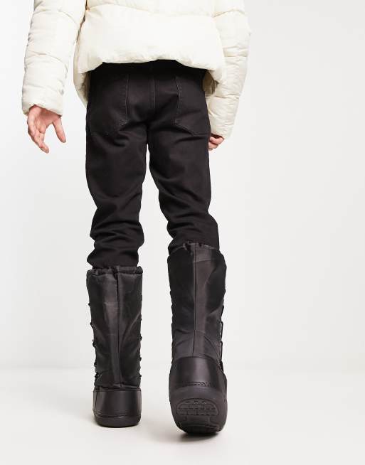 Truffle Collection high leg snow boots in black | ASOS