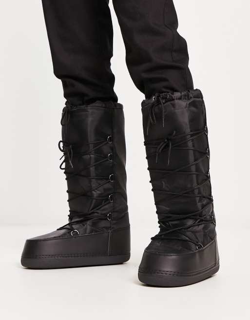 Truffle Collection high leg snow boots in black