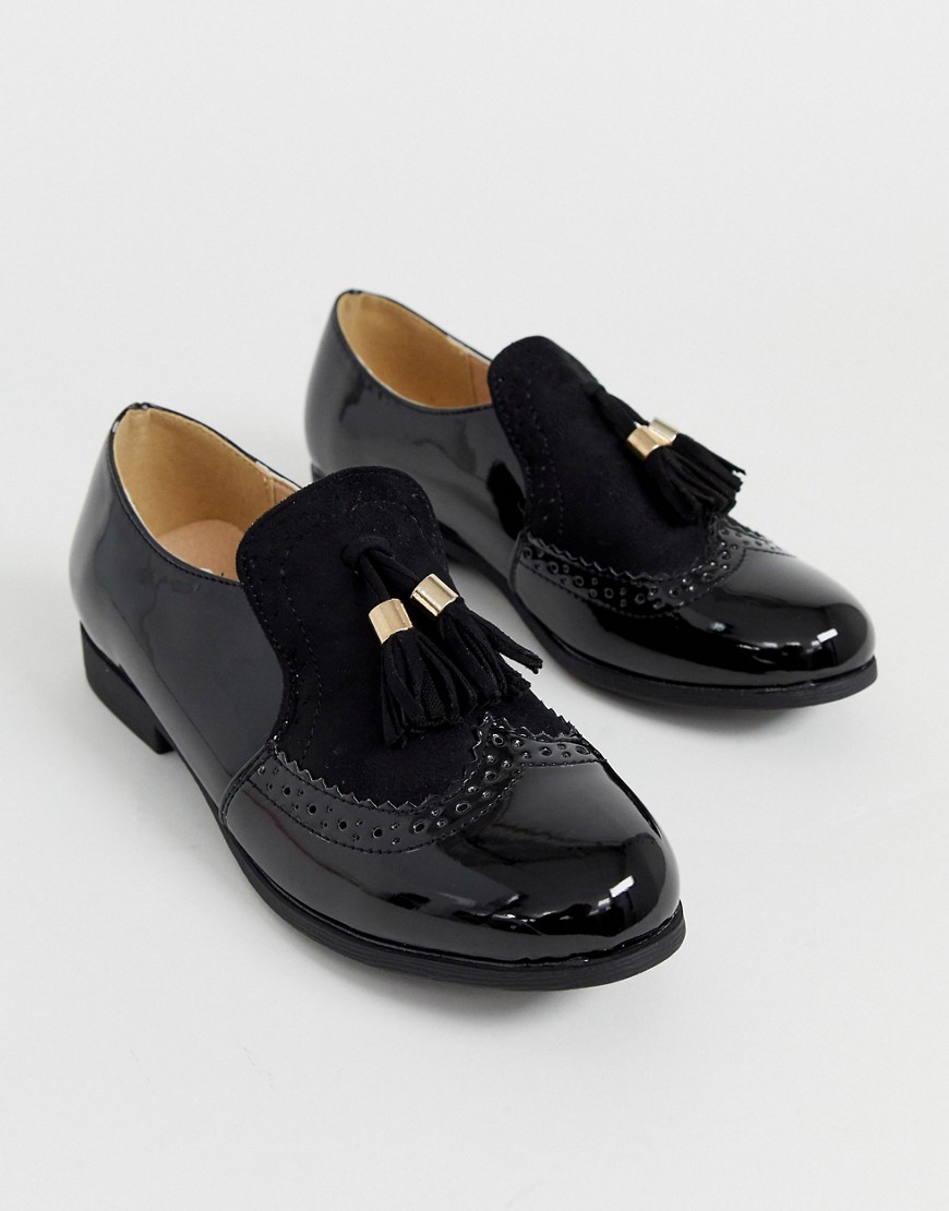 Truffle Collection - Instap-loafers met kwast in zwart