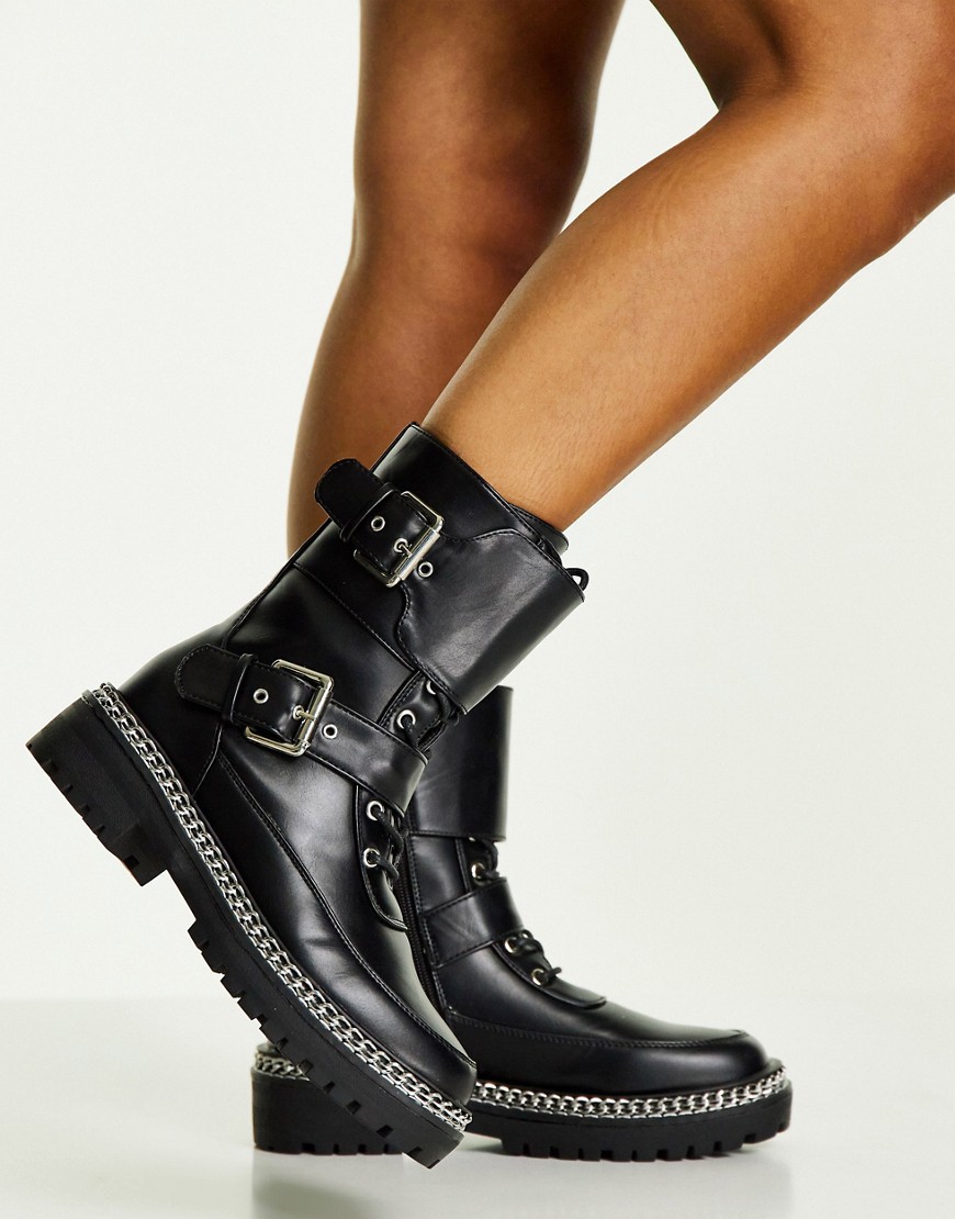Truffle Collection lace up buckle detail boots with chain sole in black