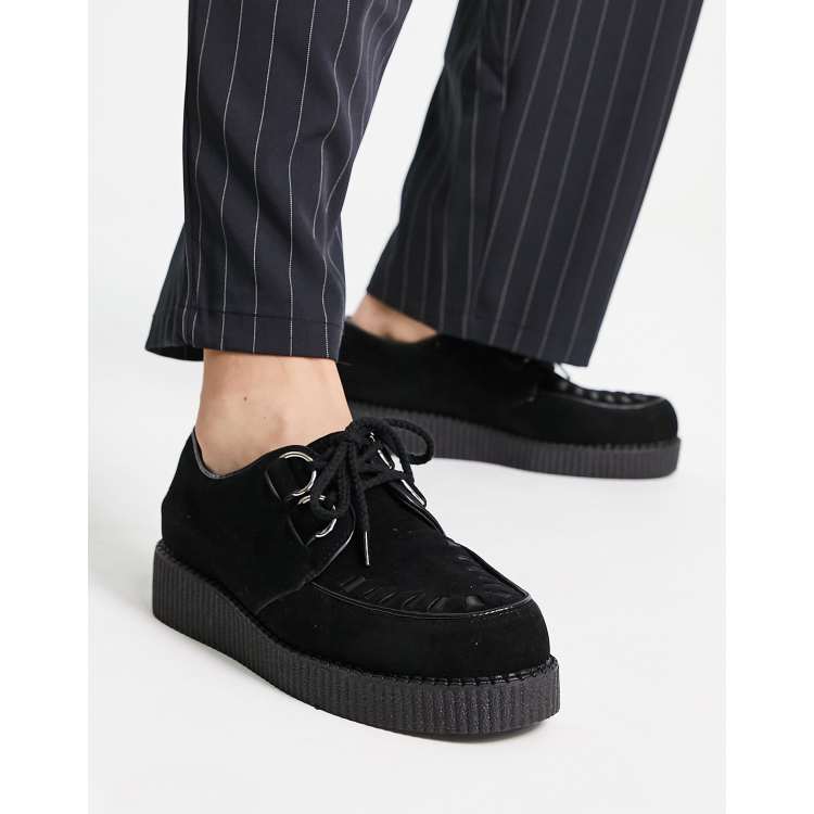 Black store creeper sneakers