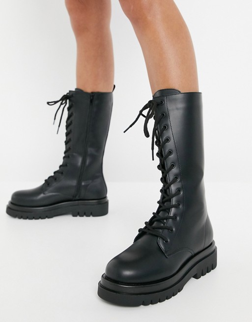 Truffle Collection lace up knee high chunky boots in black