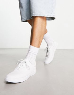 Truffle Collection lace up plimsolls in white