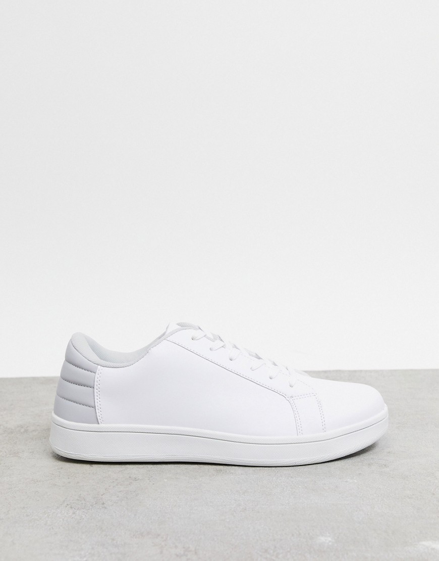 Truffle Collection lace up sneakers in white with gray heel