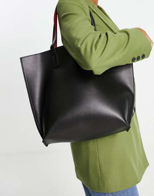 Truffle Collection zip pocket tote bag in black