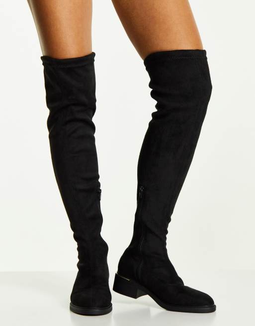 Truffle Collection mid heel stretch over the knee boots in black | ASOS