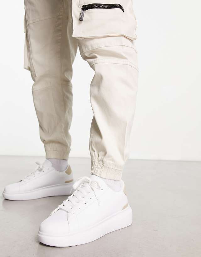 Truffle Collection minimal chunky hardware sneakers in white/nude