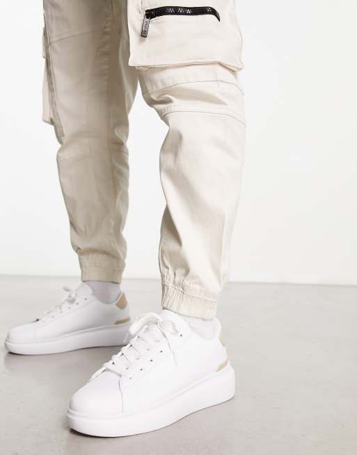 White and nude store trainers