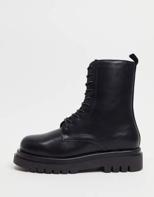 truffle collection chunky lace up boots in black