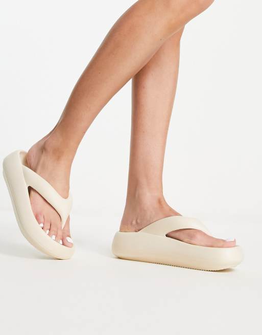 Truffle Collection moulded flip flops in cream ASOS